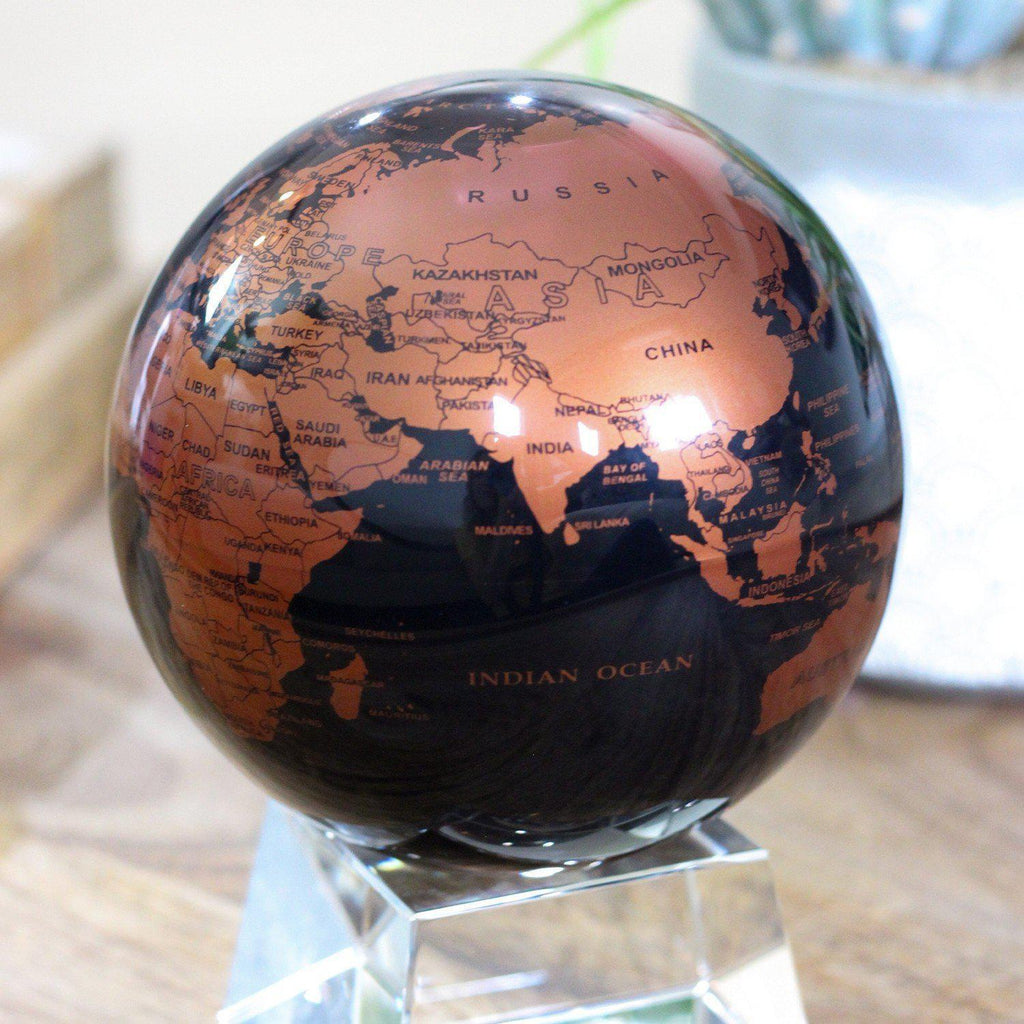 Globe terre auto-rotatif noir et argent (diam 20 cm)